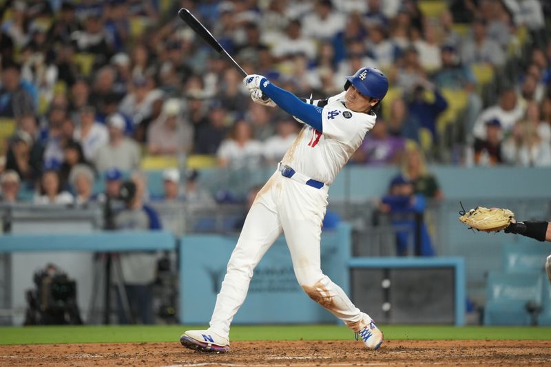 Sep 9, 2025; Los Angeles, California, USA; Los Angeles Dodgers designated hitter Shohei Ohtani (17) bats in the seventh inning against the Colorado Rockies at Dodger Stadium. Mandatory Credit: Kirby Lee-Imagn Images