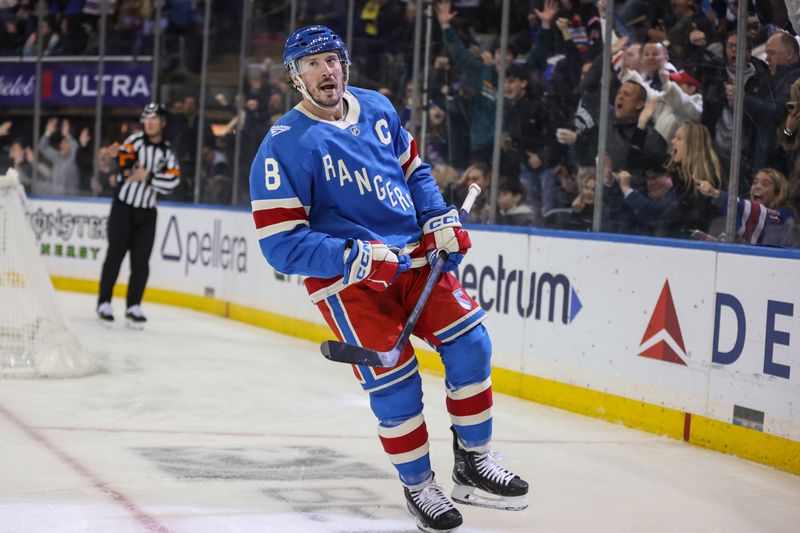 Dec 13, 2025; New York, New York, USA;  New York Rangers center J.T. Miller (8) celebrates after scoring a goal in the second period against the Montréal Canadiens at Madison Square Garden. Mandatory Credit: Wendell Cruz-Imagn Images
