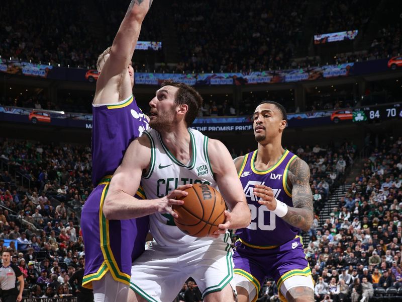 SALT LAKE CITY, UT - MARCH 12:  Luke Kornet #40 of the Boston Celtics handles the ball during the game  on March 12, 2024 at Delta Center in Salt Lake City, Utah. NOTE TO USER: User expressly acknowledges and agrees that, by downloading and or using this Photograph, User is consenting to the terms and conditions of the Getty Images License Agreement. Mandatory Copyright Notice: Copyright 2024 NBAE (Photo by Melissa Majchrzak/NBAE via Getty Images)