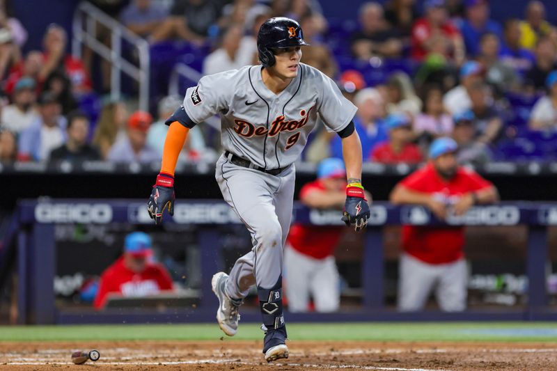 Jul 29, 2023; Miami, Florida, USA; Detroit Tigers second baseman Nick Maton (9) runs toward first base after hitting a single against the Miami Marlins during the fifth inning at loanDepot Park. Mandatory Credit: Sam Navarro-USA TODAY Sports