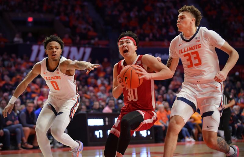 Jan 31, 2023; Champaign, Illinois, USA; Illinois Fighting Illini guard Terrence Shannon Jr. (0) and forward Coleman Hawkins (33) chase down Nebraska Cornhuskers guard Keisei Tominaga (30) as he drives to the basket during the second half at State Farm Center. Mandatory Credit: Ron Johnson-USA TODAY Sports