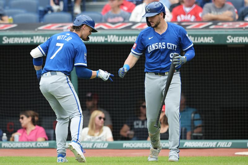 Aug 28, 2024; Cleveland, Ohio, USA; Kansas City Royals shortstop Bobby Witt Jr. (7) celebrates with first baseman Vinnie Pasquantino (9) after hitting a home run during the third inning against the Cleveland Guardians at Progressive Field. Mandatory Credit: Ken Blaze-USA TODAY Sports