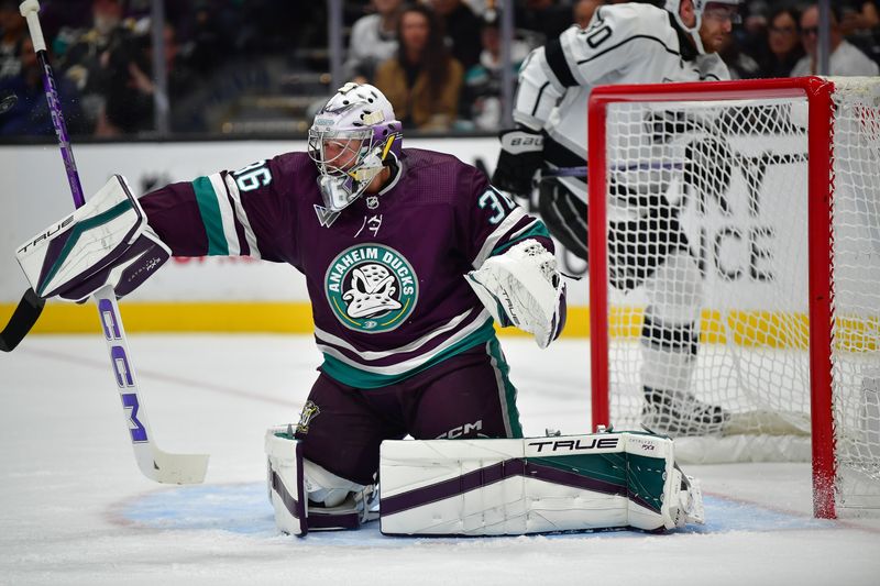 Nov 24, 2023; Anaheim, California, USA; Anaheim Ducks goaltender John Gibson (36) blocks a shot against the Los Angeles Kings during the first period at Honda Center. Mandatory Credit: Gary A. Vasquez-USA TODAY Sports