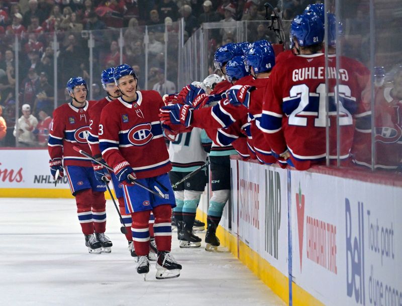 Oct 14, 2025; Montreal, Quebec, CAN; Montreal Canadiens forward Ivan Demidov (93) celebrates with teammates after assisting on the goal by teammate forward Alex Newhook (15) during the first period of the game against the Seattle Kraken at the Bell Centre. Mandatory Credit: Eric Bolte-Imagn Images