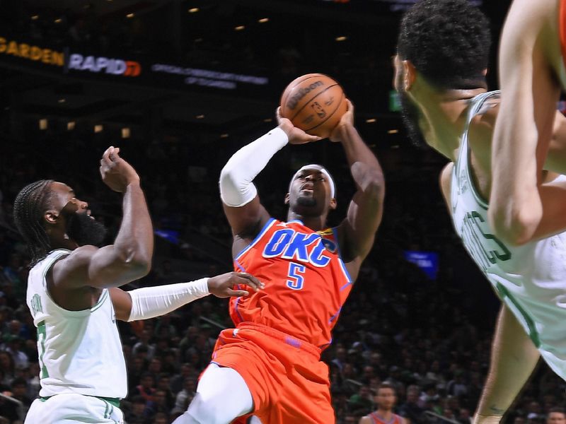 BOSTON, MA - APRIL 3: Luguentz Dort #5 of the Oklahoma City Thunder shoots the ball during the game against the Boston Celtics on April 3, 2024 at the TD Garden in Boston, Massachusetts. NOTE TO USER: User expressly acknowledges and agrees that, by downloading and or using this photograph, User is consenting to the terms and conditions of the Getty Images License Agreement. Mandatory Copyright Notice: Copyright 2024 NBAE  (Photo by Brian Babineau/NBAE via Getty Images)