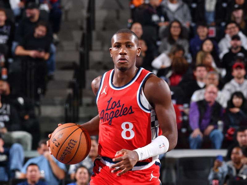 INGLEWOOD, CA - NOVEMBER 22: Kris Dunn #8 of the LA Clippers dribbles the ball during the game against the Sacramento Kings during the Emirates NBA Cup game on November 22, 2024 at the Intuit Dome in Los Angeles, California. NOTE TO USER: User expressly acknowledges and agrees that, by downloading and/or using this Photograph, user is consenting to the terms and conditions of the Getty Images License Agreement. Mandatory Copyright Notice: Copyright 2024 NBAE (Photo by Juan Ocampo/NBAE via Getty Images)