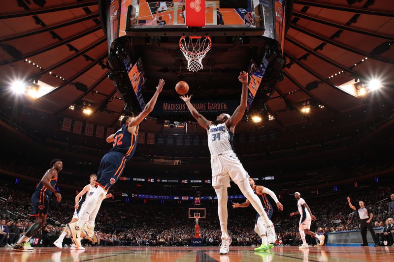 NEW YORK, NY - DECEMBER 3: Wendell Carter Jr. #34 of the Orlando Magic goes up for the rebound during the game against the New York Knicks during the Emirates NBA Cup on December 3, 2024 at Madison Square Garden in New York City, New York.  NOTE TO USER: User expressly acknowledges and agrees that, by downloading and or using this photograph, User is consenting to the terms and conditions of the Getty Images License Agreement. Mandatory Copyright Notice: Copyright 2024 NBAE  (Photo by Nathaniel S. Butler/NBAE via Getty Images)