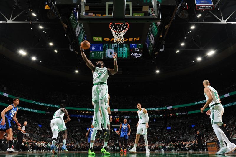 BOSTON, MA - JANUARY 17: Jaylen Brown #7 of the Boston Celtics rebounds the ball during the game against the Orlando Magic on January 17, 2025 at TD Garden in Boston, Massachusetts. NOTE TO USER: User expressly acknowledges and agrees that, by downloading and/or using this Photograph, user is consenting to the terms and conditions of the Getty Images License Agreement. Mandatory Copyright Notice: Copyright 2025 NBAE (Photo by Brian Babineau/NBAE via Getty Images)