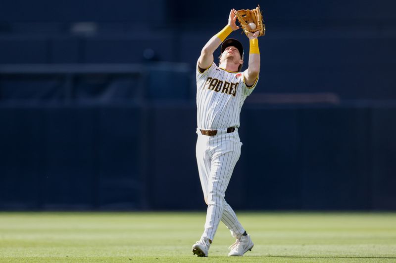 May 27, 2024; San Diego, California, USA; San Diego Padres second baseman Jake Cronenworth (9) catches a pop fly for an out during the sixth inning against the Miami Marlins at Petco Park. Mandatory Credit: David Frerker-USA TODAY Sports