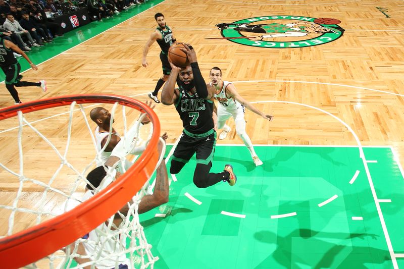 BOSTON, MA - FEBRUARY 3: Jaylen Brown #7 of the Boston Celtics rebounds the ball during the game against the Phoenix Suns on February 3, 2023 at TD Garden in Boston, Massachusetts.  NOTE TO USER: User expressly acknowledges and agrees that, by downloading and or using this photograph, User is consenting to the terms and conditions of the Getty Images License Agreement. Mandatory Copyright Notice: Copyright 2022 NBAE  (Photo by Nathaniel S. Butler/NBAE via Getty Images)