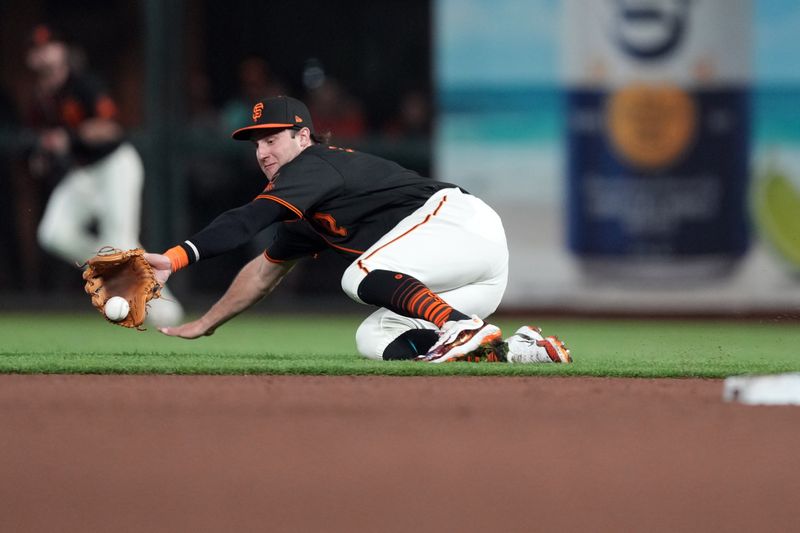 Jun 3, 2023; San Francisco, California, USA;  San Francisco Giants second baseman Casey Schmitt (6) makes a diving stop against the Baltimore Orioles during the eighth inning at Oracle Park. Mandatory Credit: Darren Yamashita-USA TODAY Sports