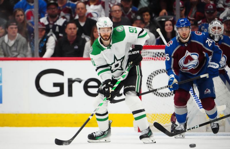 May 17, 2024; Denver, Colorado, USA; Dallas Stars center Tyler Seguin (91) awaits the puck in the second period against the Colorado Avalanche in game six of the second round of the 2024 Stanley Cup Playoffs at Ball Arena. Mandatory Credit: Ron Chenoy-USA TODAY Sports