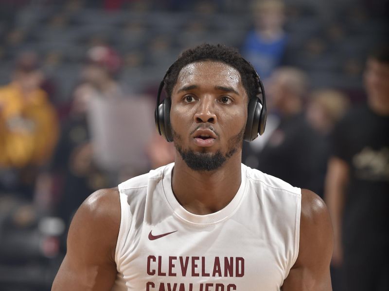 CLEVELAND, OH - FEBRUARY 27: Donovan Mitchell #45 of the Cleveland Cavaliers warms up before the game against the against the Dallas Mavericks on February 27, 2024 at Rocket Mortgage FieldHouse in Cleveland, Ohio. NOTE TO USER: User expressly acknowledges and agrees that, by downloading and/or using this Photograph, user is consenting to the terms and conditions of the Getty Images License Agreement. Mandatory Copyright Notice: Copyright 2024 NBAE (Photo by David Liam Kyle/NBAE via Getty Images)