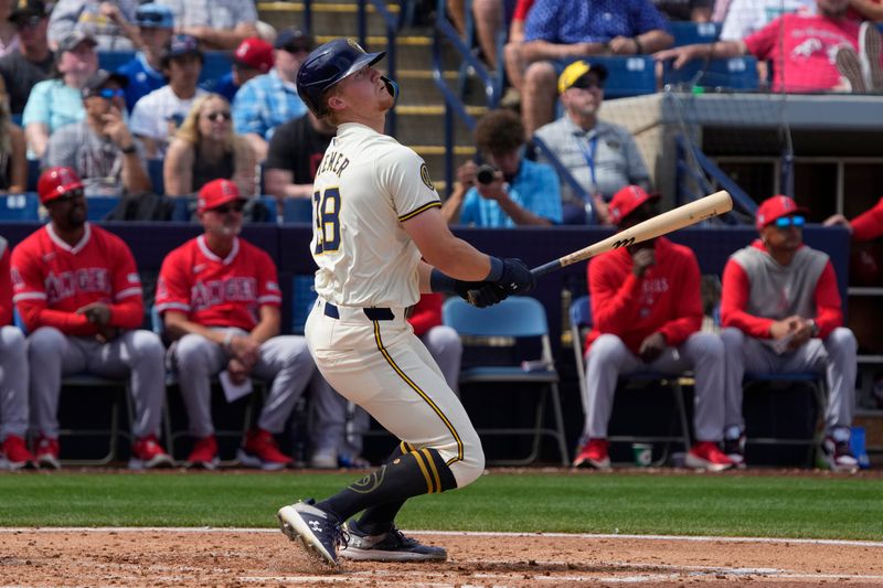 Mar 18, 2024; Phoenix, Arizona, USA; Milwaukee Brewers center fielder Joey Wiemer (28) hits against the Los Angeles Angels in the second inning at American Family Fields of Phoenix. Mandatory Credit: Rick Scuteri-USA TODAY Sports