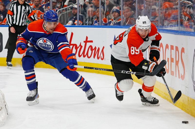 Jan 2, 2024; Edmonton, Alberta, CAN; Philadelphia Flyers forward Cam Atkinson (89) and Edmonton Oilers defensemen Cody Ceci (5) battle along the boards for a loose puck during the second period at Rogers Place. Mandatory Credit: Perry Nelson-USA TODAY Sports