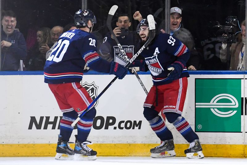 Dec 23, 2023; New York, New York, USA; New York Rangers left wing Chris Kreider (20) celebrates his overtime winning goal against the Buffalo Sabres with New York Rangers center Mika Zibanejad (93) during the overtime period at Madison Square Garden. Mandatory Credit: Dennis Schneidler-USA TODAY Sports