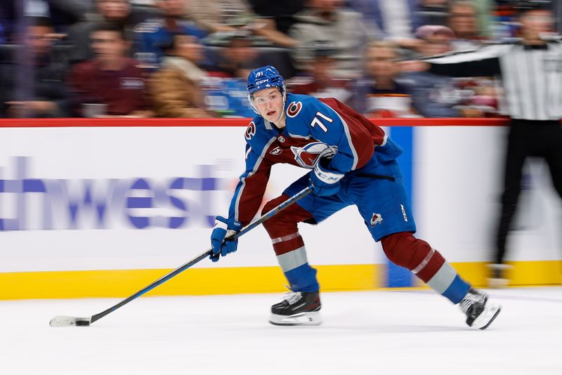 Oct 14, 2024; Denver, Colorado, USA; Colorado Avalanche center Calum Ritchie (71) controls the puck in the second period against the New York Islanders at Ball Arena. Mandatory Credit: Isaiah J. Downing-Imagn Images