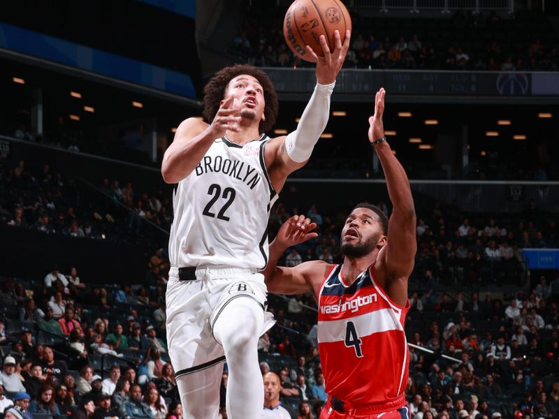 BROOKLYN, NY - OCTOBER 14: Jalen Wilson #22 of the Brooklyn Nets drives to the basket during the game against the Washington Wizards during a NBA preseason game on October 14, 2024 at Barclays Center in Brooklyn, New York. NOTE TO USER: User expressly acknowledges and agrees that, by downloading and or using this Photograph, user is consenting to the terms and conditions of the Getty Images License Agreement. Mandatory Copyright Notice: Copyright 2024 NBAE (Photo by Nathaniel S. Butler/NBAE via Getty Images)