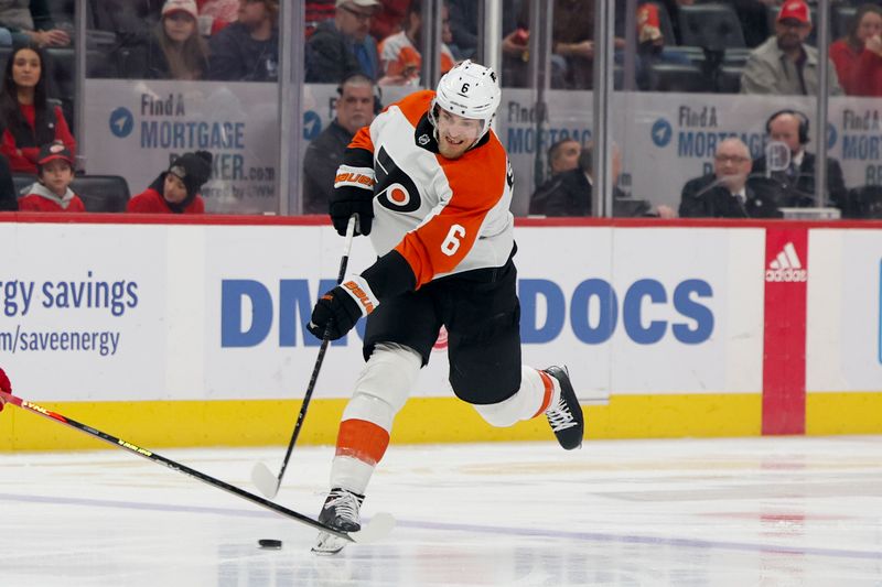 Jan 25, 2024; Detroit, Michigan, USA;  Philadelphia Flyers defenseman Travis Sanheim (6) takes a shot in the first period against the Detroit Red Wings at Little Caesars Arena. Mandatory Credit: Rick Osentoski-USA TODAY Sports