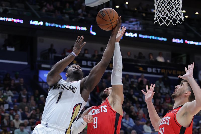 NEW ORLEANS, LOUISIANA - FEBRUARY 22: Zion Williamson #1 of the New Orleans Pelicans shoots against Dillon Brooks #9 of the Houston Rockets during the second half at the Smoothie King Center on February 22, 2024 in New Orleans, Louisiana. NOTE TO USER: User expressly acknowledges and agrees that, by downloading and or using this Photograph, user is consenting to the terms and conditions of the Getty Images License Agreement. (Photo by Jonathan Bachman/Getty Images)