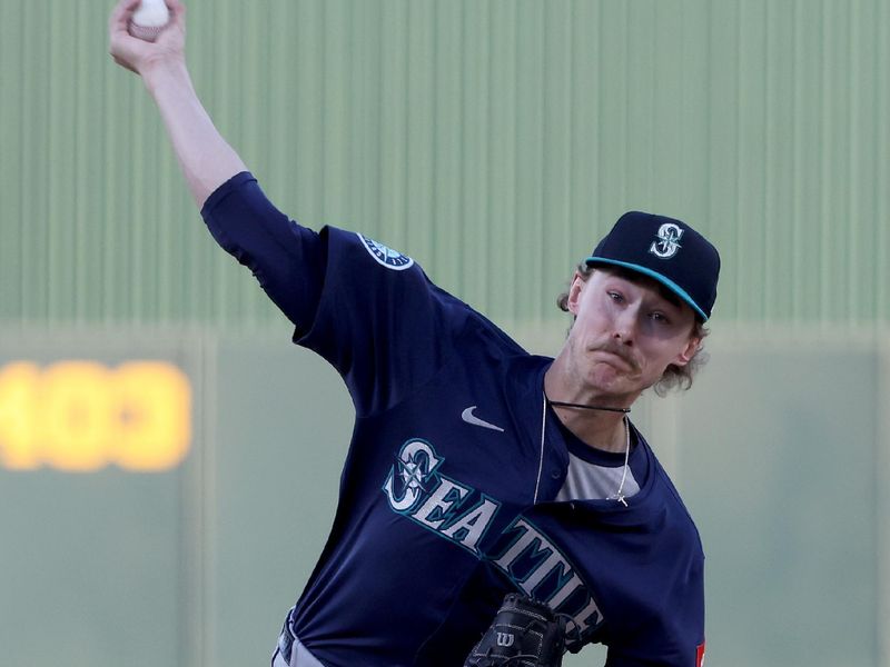 May 5, 2025; West Sacramento, California, USA; Seattle Mariners starting pitcher Bryce Miller (50) throws against the Athletics during the first inning at Sutter Health Park. Mandatory Credit: Dennis Lee-Imagn Images