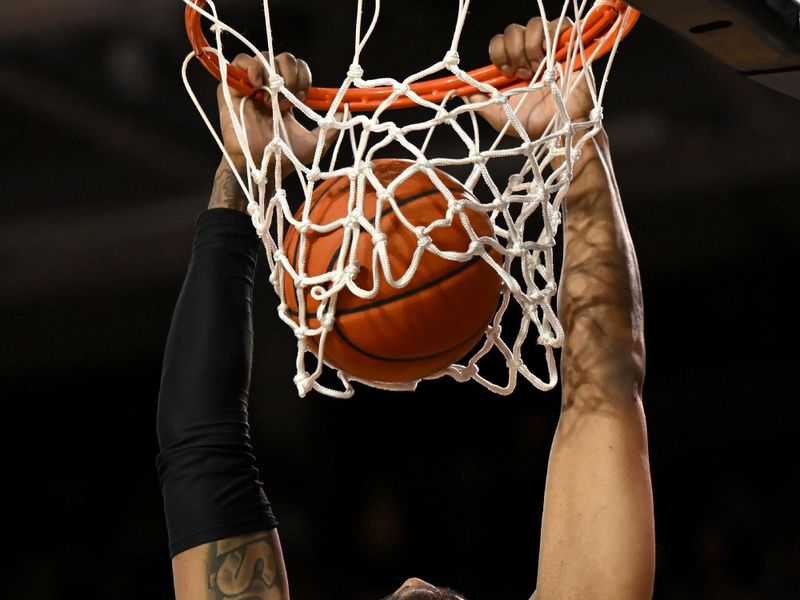 Feb 25, 2023; Greenville, North Carolina, USA;  Houston Cougars forward J'Wan Roberts (13) dunks during the second half at Williams Arena at Minges Coliseum. Mandatory Credit: William Howard-USA TODAY Sports