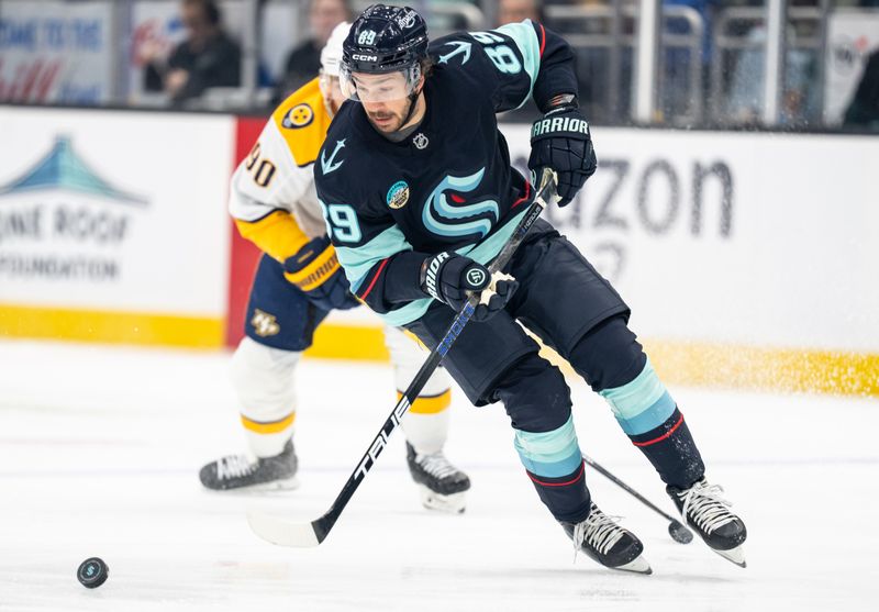 Mar 10, 2026; Seattle, Washington, USA; Seattle Kraken forward Frederick Gaudreau (89) skates with the puck during the first period against the Nashville Predators at Climate Pledge Arena. Mandatory Credit: Stephen Brashear-Imagn Images