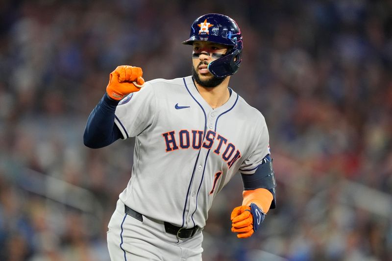 Sep 10, 2025; Toronto, Ontario, CAN; Houston Astros shortstop Carlos Correa (1) reacts after hitting a solo home run against the Toronto Blue Jays during the sixth inning at Rogers Centre. Mandatory Credit: John E. Sokolowski-Imagn Images