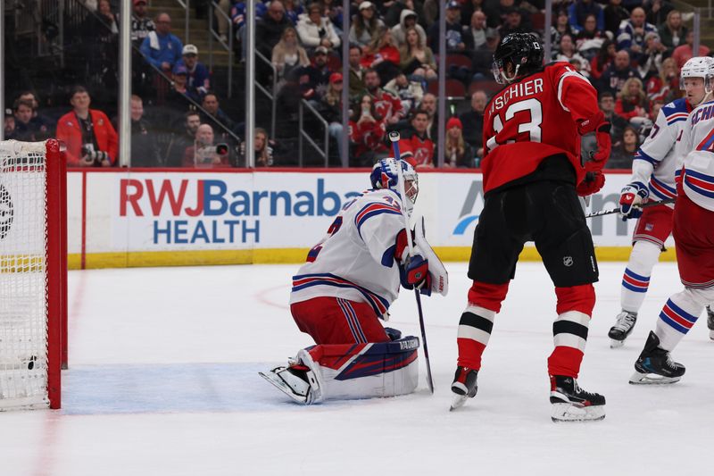 Mar 7, 2026; Newark, New Jersey, USA; New York Rangers goaltender Jonathan Quick (32) allows a New Jersey Devils goal during the second period at Prudential Center. Mandatory Credit: Thomas Salus-Imagn Images