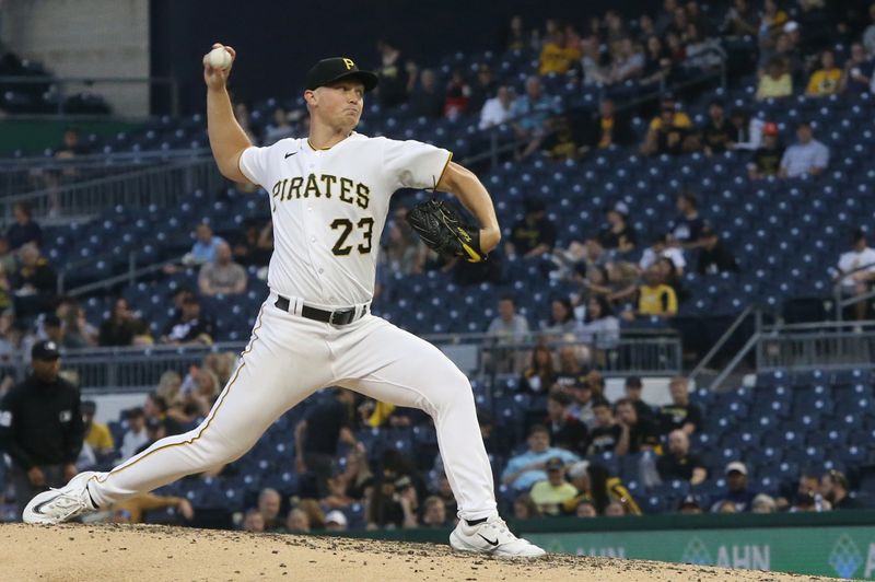 Jun 6, 2023; Pittsburgh, Pennsylvania, USA; Pittsburgh Pirates starting pitcher Mitch Keller (23) pitches against the Oakland Athletics during the fourth inning at PNC Park. Mandatory Credit: Charles LeClaire-USA TODAY Sports