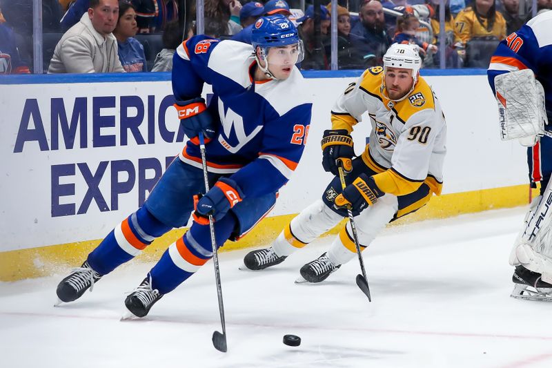 Apr 6, 2024; Elmont, New York, USA; New York Islanders defenseman Alexander Romanov (28) moves the puck past Nashville Predators center Ryan O'Reilly (90) during the third period at UBS Arena. Mandatory Credit: Tom Horak-USA TODAY Sports