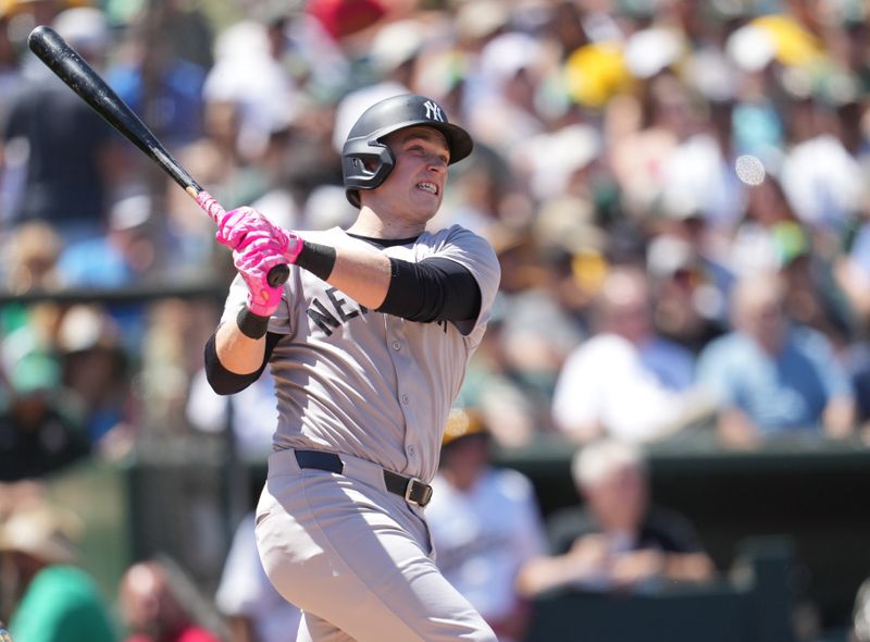 May 11, 2025; West Sacramento, California, USA; New York Yankees designated hitter Ben Rice (22) hits a grand slam against the Athletics in the fifth inning at Sutter Health Park. Mandatory Credit: Cary Edmondson-Imagn Images
