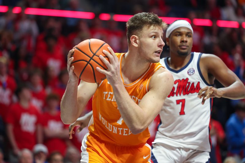 Mar 5, 2025; Oxford, Mississippi, USA; Tennessee Volunteers forward Igor Miličić Jr. (7) handles the ball against the Mississippi Rebels during the second half at The Sandy and John Black Pavilion at Ole Miss. Mandatory Credit: Wesley Hale-Imagn Images