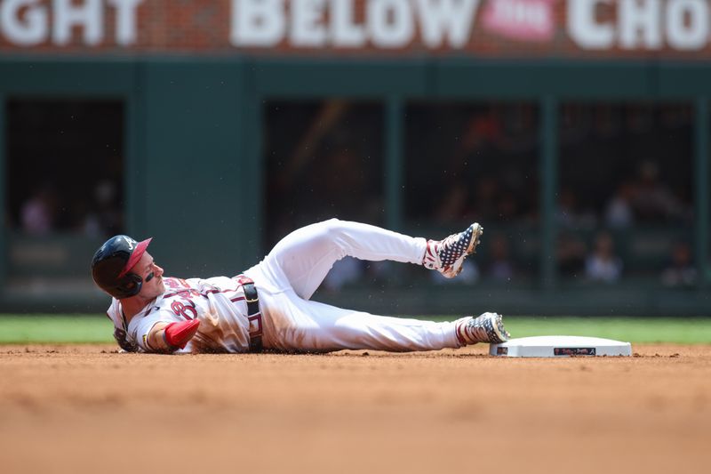 Jul 7, 2024; Atlanta, Georgia, USA; Atlanta Braves center fielder Jarred Kelenic (24) slides safely into second with a stolen base against the Philadelphia Phillies in the first inning at Truist Park. Mandatory Credit: Brett Davis-USA TODAY Sports
