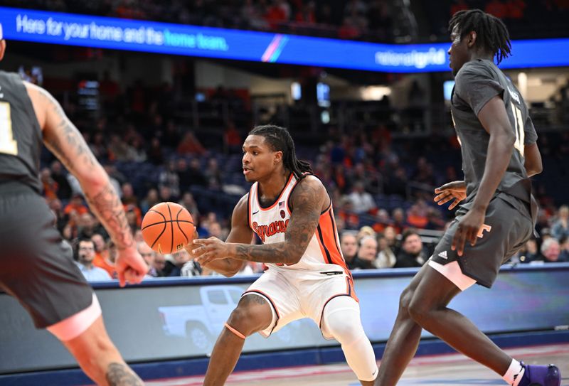Jan 7, 2025; Syracuse, New York, USA; Syracuse Orange forward Jyare Davis (13) passes the ball in the second half against the Georgia Tech Yellow Jackets at the JMA Wireless Dome. Mandatory Credit: Mark Konezny-Imagn Images