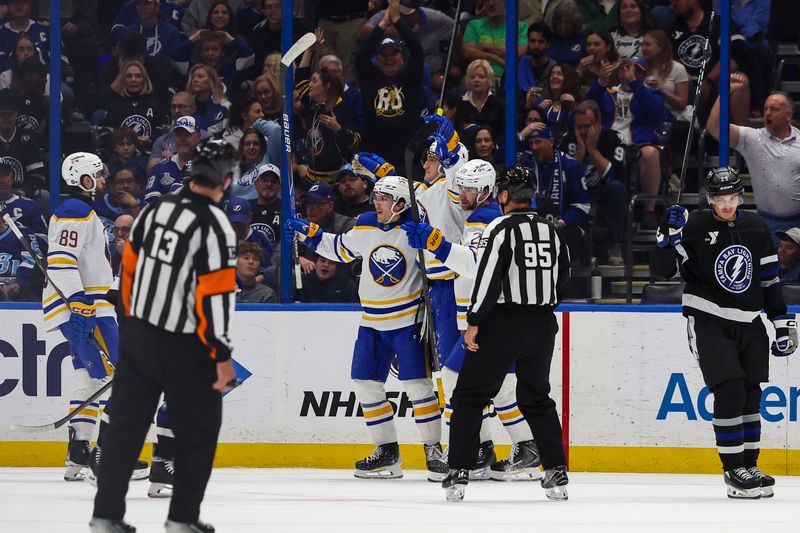 Feb 28, 2026; Tampa, Florida, USA; Buffalo Sabres forward Tage Thompson (72) celebrates a goal with defenseman Mattias Samuelsson (23), forward Peyton Krebs (19) and forward Alex Tuch (89) against the Tampa Bay Lightning during the first period at Benchmark International Arena. Mandatory Credit: Morgan Tencza-Imagn Images 