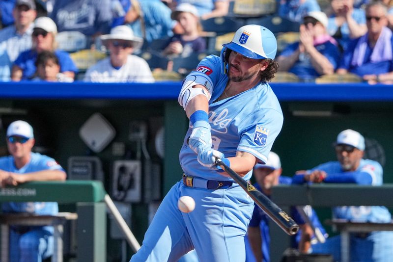 May 31, 2025; Kansas City, Missouri, USA; Kansas City Royals designated hitter Vinnie Pasquantino (9) his a one run single against the Detroit Tigers in the eighth inning at Kauffman Stadium. Mandatory Credit: Denny Medley-Imagn Images