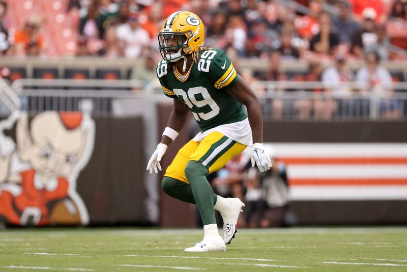 Green Bay Packers safety Xavier McKinney (29) drops back in coverage during a preseason NFL football game against the Cleveland Browns, Saturday, Aug. 10, 2024, in Cleveland. (AP Photo/Kirk Irwin)