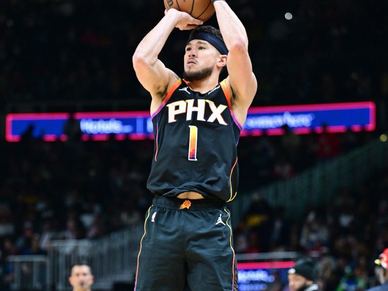 ATLANTA, GA - FEBRUARY 2: Devin Booker #1 of the Phoenix Suns three point basket during the game against the Atlanta Hawks on February 2, 2024 at State Farm Arena in Atlanta, Georgia.  NOTE TO USER: User expressly acknowledges and agrees that, by downloading and/or using this Photograph, user is consenting to the terms and conditions of the Getty Images License Agreement. Mandatory Copyright Notice: Copyright 2024 NBAE (Photo by Adam Hagy/NBAE via Getty Images)