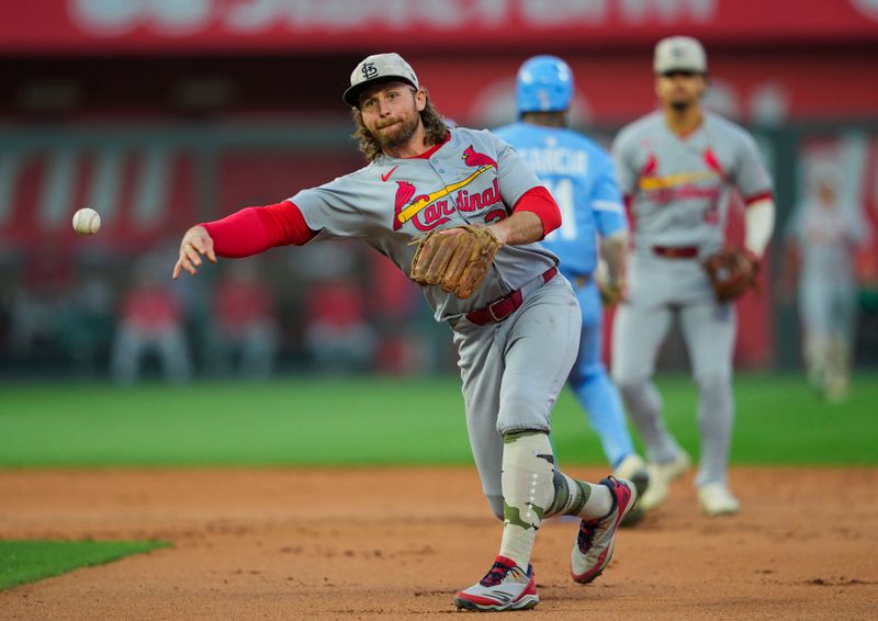 May 16, 2025; Kansas City, Missouri, USA; St. Louis Cardinals second baseman Brendan Donovan (33) throws to first base during the fourth inning against the Kansas City Royals at Kauffman Stadium. Mandatory Credit: Jay Biggerstaff-Imagn Images