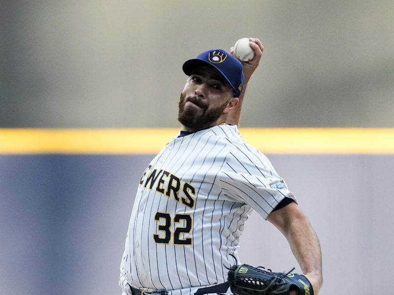 Jul 27, 2024; Milwaukee, Wisconsin, USA;  Milwaukee Brewers pitcher Aaron Civale (32) throws a pitch during the first inning against the Miami Marlins at American Family Field. Mandatory Credit: Jeff Hanisch-USA TODAY Sports