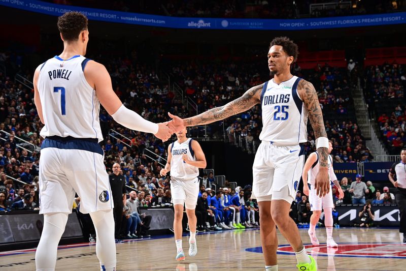 DETROIT, MI - MARCH 9: Dwight Powell #7 and PJ Washington #25 of the Dallas Mavericks high five during the game against the Detroit Pistons on March 9, 2024 at Little Caesars Arena in Detroit, Michigan. NOTE TO USER: User expressly acknowledges and agrees that, by downloading and/or using this photograph, User is consenting to the terms and conditions of the Getty Images License Agreement. Mandatory Copyright Notice: Copyright 2024 NBAE (Photo by Chris Schwegler/NBAE via Getty Images)