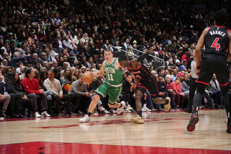 TORONTO, CANADA - JANUARY 15:  Payton Pritchard #11 of the Boston Celtics handles the ball during the game against the Toronto Raptors on January 15, 2024 at the Scotiabank Arena in Toronto, Ontario, Canada.  NOTE TO USER: User expressly acknowledges and agrees that, by downloading and or using this Photograph, user is consenting to the terms and conditions of the Getty Images License Agreement.  Mandatory Copyright Notice: Copyright 2024 NBAE (Photo by Mark Blinch/NBAE via Getty Images)