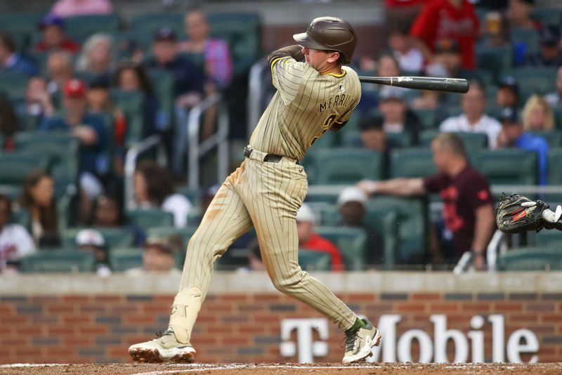 May 17, 2024; Atlanta, Georgia, USA; San Diego Padres center fielder Jackson Merrill (3) hits a single against the Atlanta Braves in the fourth inning at Truist Park. Mandatory Credit: Brett Davis-USA TODAY Sports