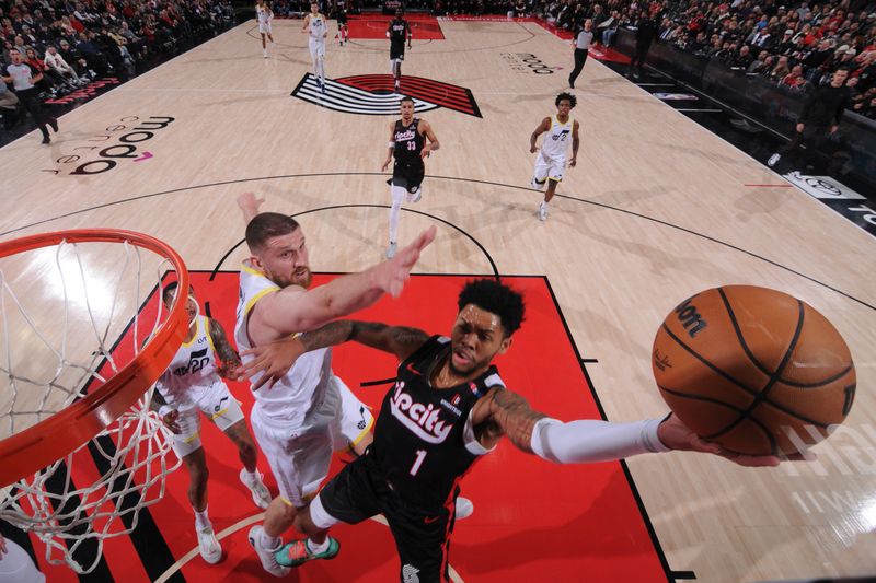 PORTLAND, OR - DECEMBER 6: Anfernee Simons #1 of the Portland Trail Blazers drives to the basket during the game against the Utah Jazz on December 6, 2024 at the Moda Center Arena in Portland, Oregon. NOTE TO USER: User expressly acknowledges and agrees that, by downloading and or using this photograph, user is consenting to the terms and conditions of the Getty Images License Agreement. Mandatory Copyright Notice: Copyright 2024 NBAE (Photo by Cameron Browne/NBAE via Getty Images)