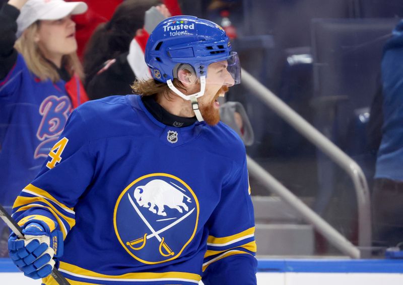 Oct 28, 2025; Buffalo, New York, USA;  Buffalo Sabres center Josh Dunne (44) reacts after scoring his first career NHL goal during the third period against the Columbus Blue Jackets at KeyBank Center. Mandatory Credit: Timothy T. Ludwig-Imagn Images