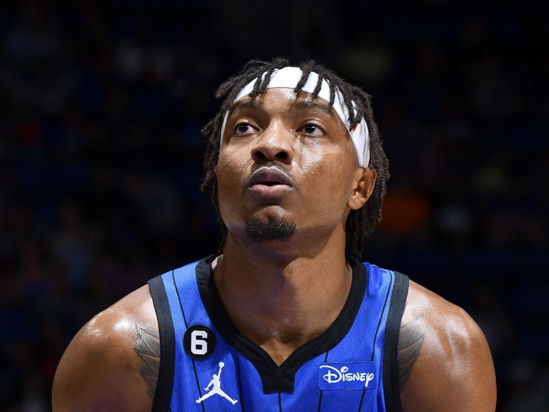 ORLANDO, FL - MARCH 23: Wendell Carter Jr. #34 of the Orlando Magic prepares to shoot a free throw during the game against the New York Knicks on March 23, 2023 at Amway Center in Orlando, Florida. NOTE TO USER: User expressly acknowledges and agrees that, by downloading and or using this photograph, User is consenting to the terms and conditions of the Getty Images License Agreement. Mandatory Copyright Notice: Copyright 2023 NBAE (Photo by Fernando Medina/NBAE via Getty Images)