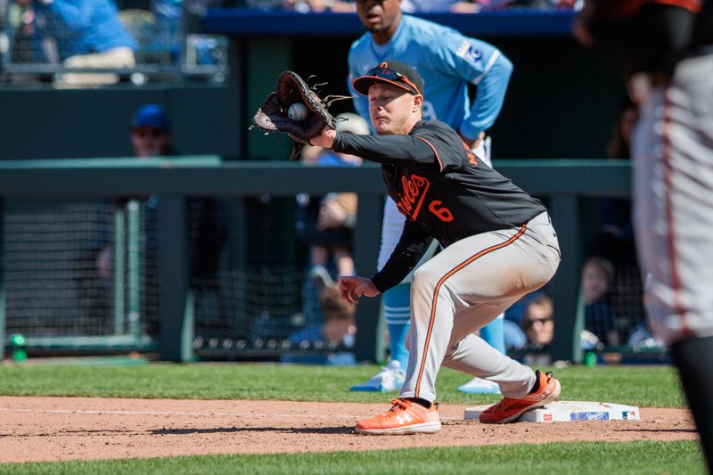 Apr 21, 2024; Kansas City, Missouri, USA; Baltimore Orioles first base Ryan Mountcastle (6) reaches for a throw to first base during the ninth inning against the Kansas City Royals at Kauffman Stadium. Mandatory Credit: William Purnell-USA TODAY Sports