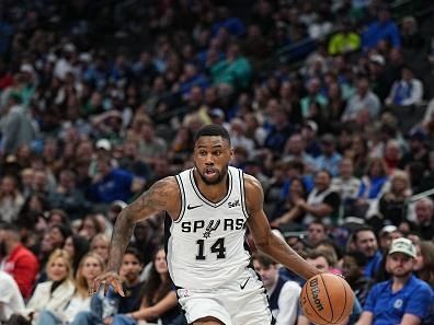 DALLAS, TX - DECEMBER 23: Blake Wesley #14 of the San Antonio Spurs drives to the basket during the game against the Dallas Mavericks on December 23, 2023 at the American Airlines Center in Dallas, Texas. NOTE TO USER: User expressly acknowledges and agrees that, by downloading and or using this photograph, User is consenting to the terms and conditions of the Getty Images License Agreement. Mandatory Copyright Notice: Copyright 2023 NBAE (Photo by Glenn James/NBAE via Getty Images)