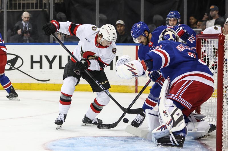 Nov 1, 2024; New York, New York, USA;  Ottawa Senators center Ridly Greig (71) and New York Rangers center Vincent Trocheck (16) battle for control of the puck in the first period at Madison Square Garden. Mandatory Credit: Wendell Cruz-Imagn Images